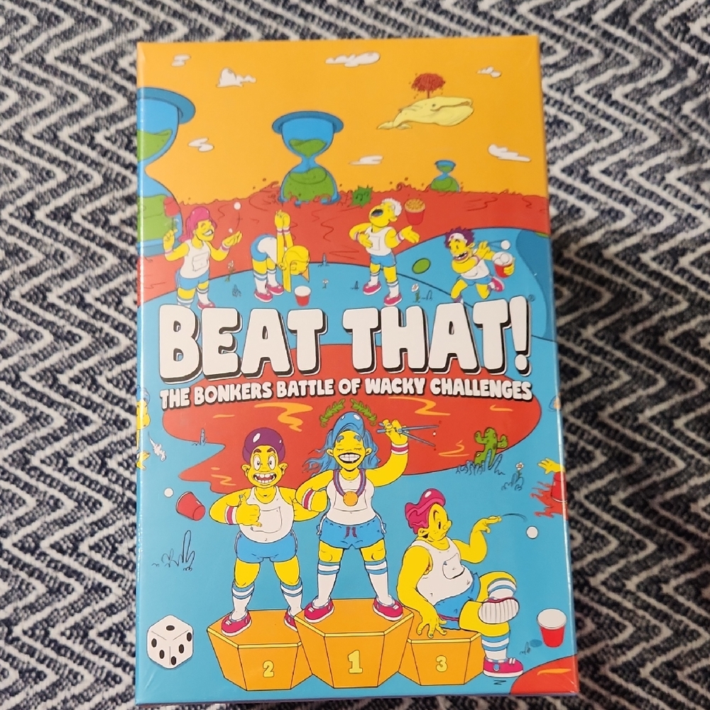 Beat That! The Bonkers Battle of Wacky Challenges - Colorful Game Box